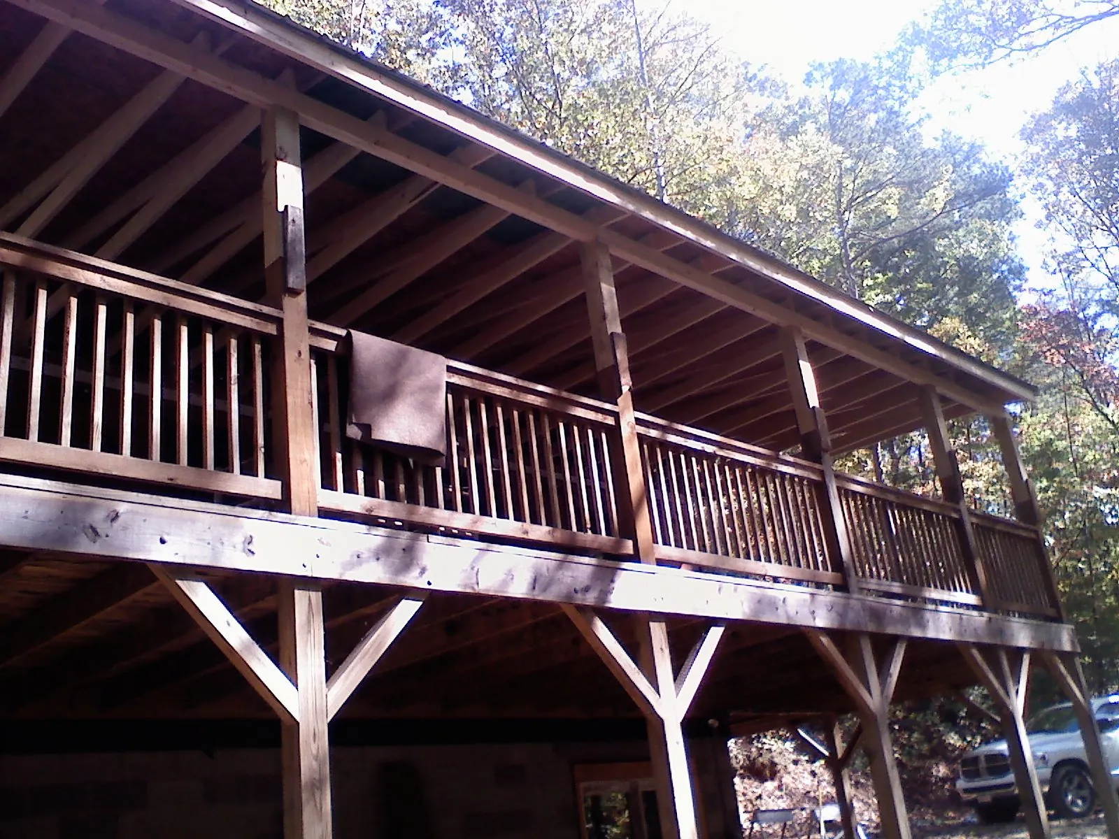 Timber framing under a new elevated porch and deck — Roof Leak Repair in Saratoga by Roofing Brothers